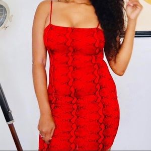 Vibrant red snake dress